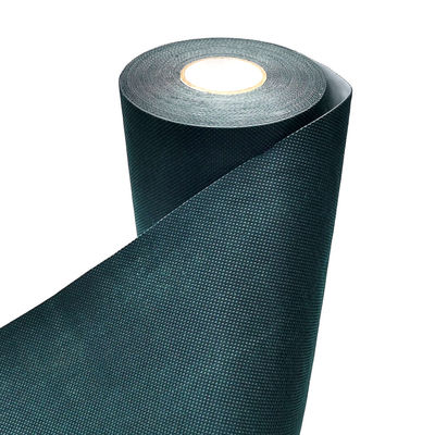 L'erba artificiale sintetica verde che cuce il nastro per il prato inglese del tappeto erboso tappezza congiungere